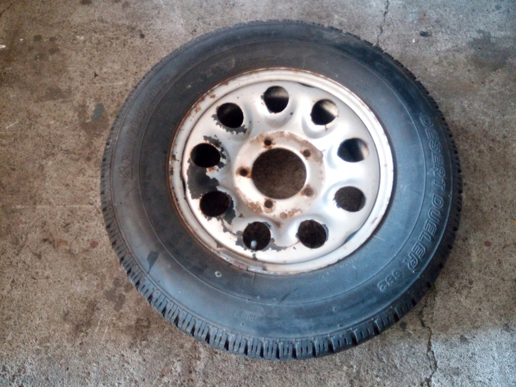 rueda repuesto portón kia, sportage